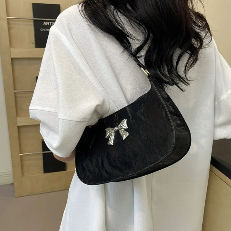 Nordspur | Bowvette Compact Crescent Underarm Bag With Bow Detail