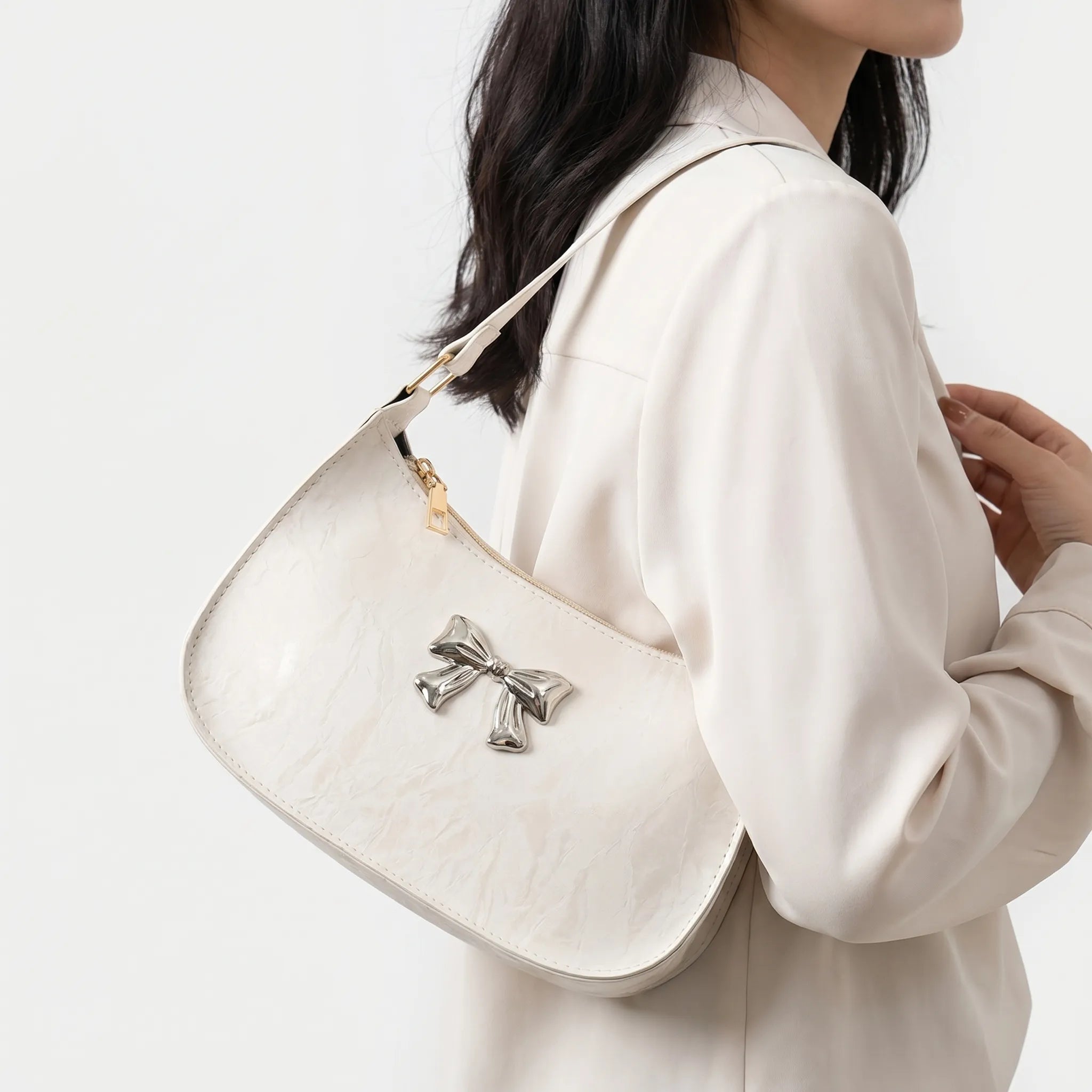 Nordspur | Bowvette Compact Crescent Underarm Bag With Bow Detail