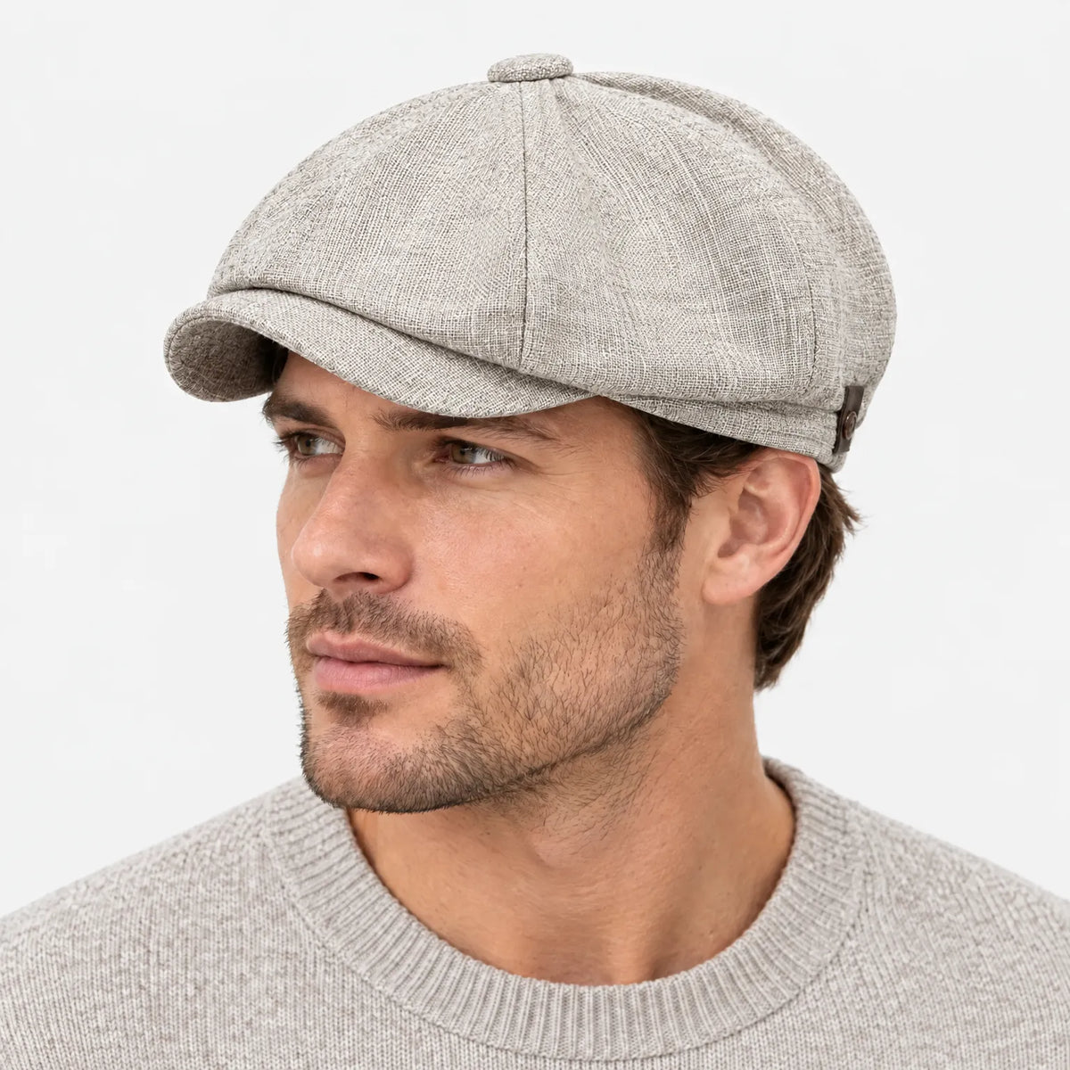 Eight-panel flat cap with herringbone pattern and short peak