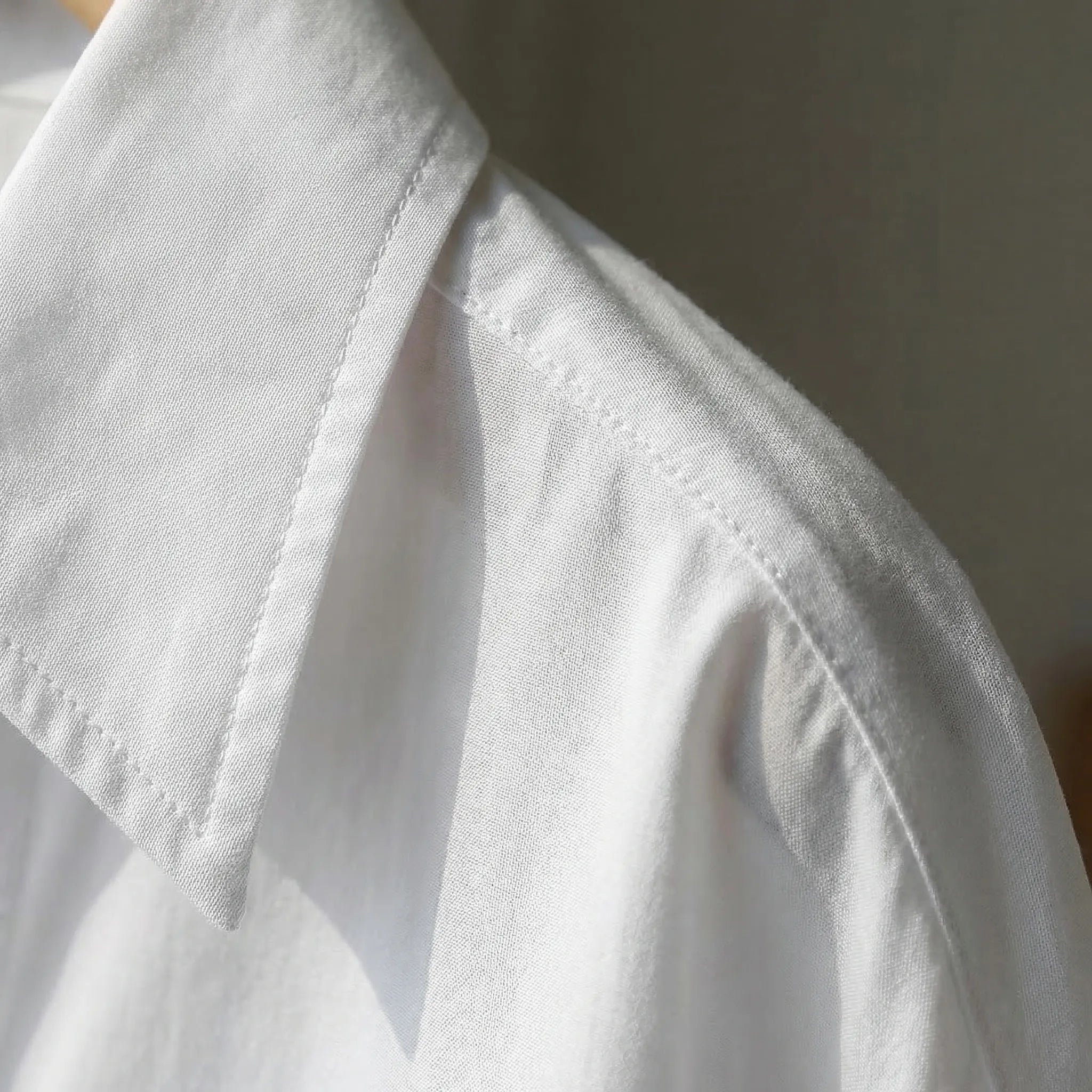 Nordspur | Sevelline Wide-Sleeve Asymmetric Hem Blouse
