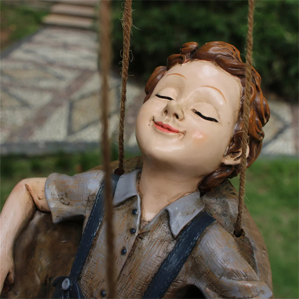 Nordspur | Swinlore Hanging Boy On Swing Sculpture