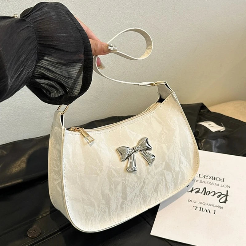 Nordspur | Bowvette Compact Crescent Underarm Bag With Bow Detail