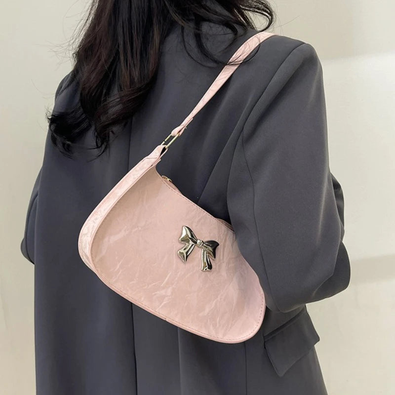Nordspur | Bowvette Compact Crescent Underarm Bag With Bow Detail