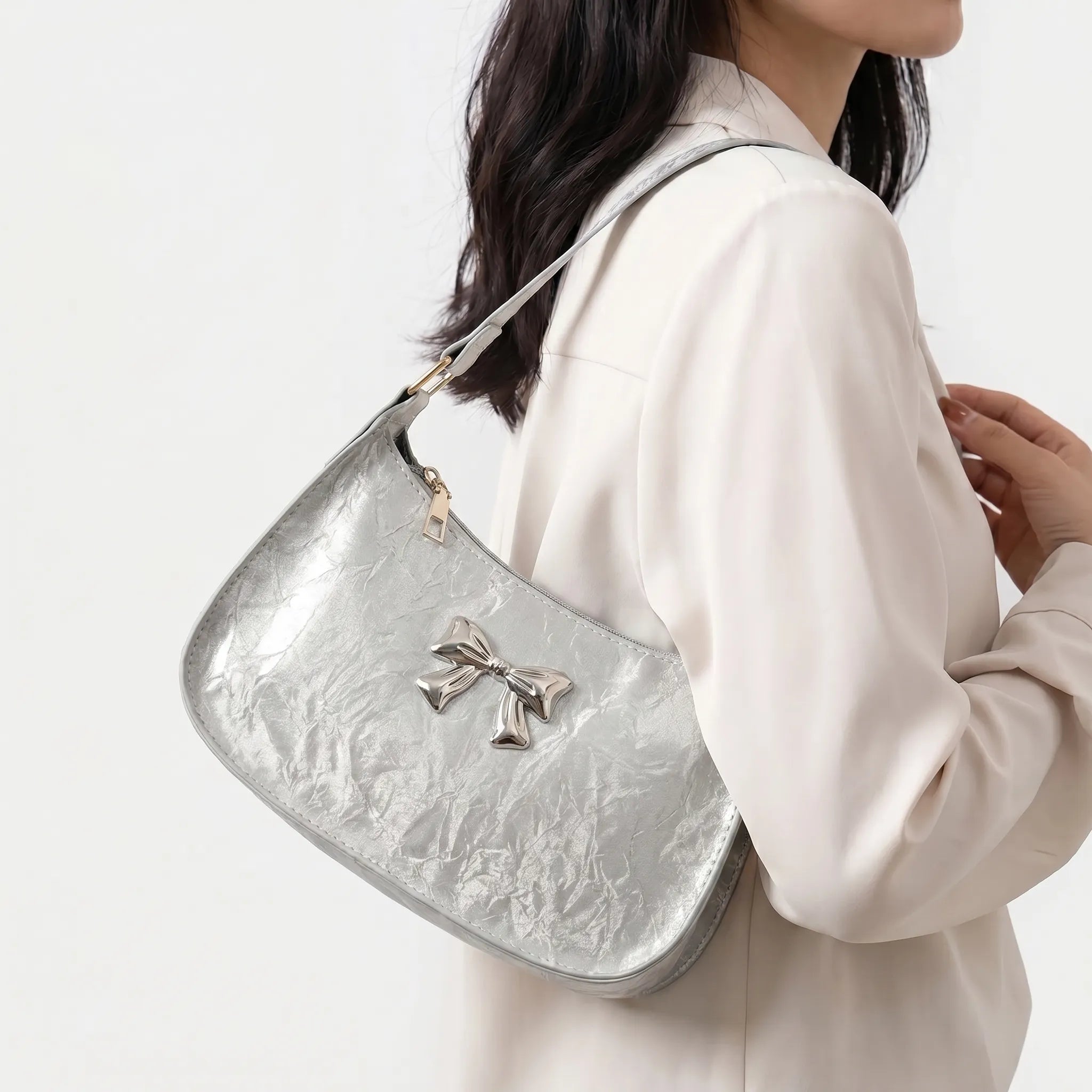 Nordspur | Bowvette Compact Crescent Underarm Bag With Bow Detail
