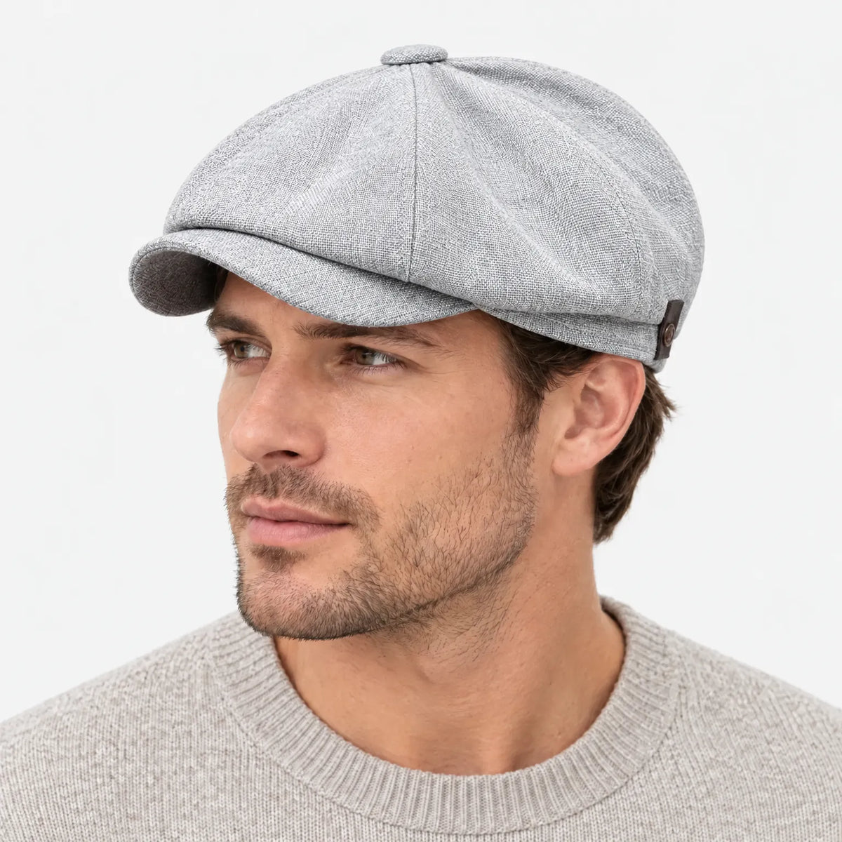 Eight-panel flat cap with herringbone pattern and short peak