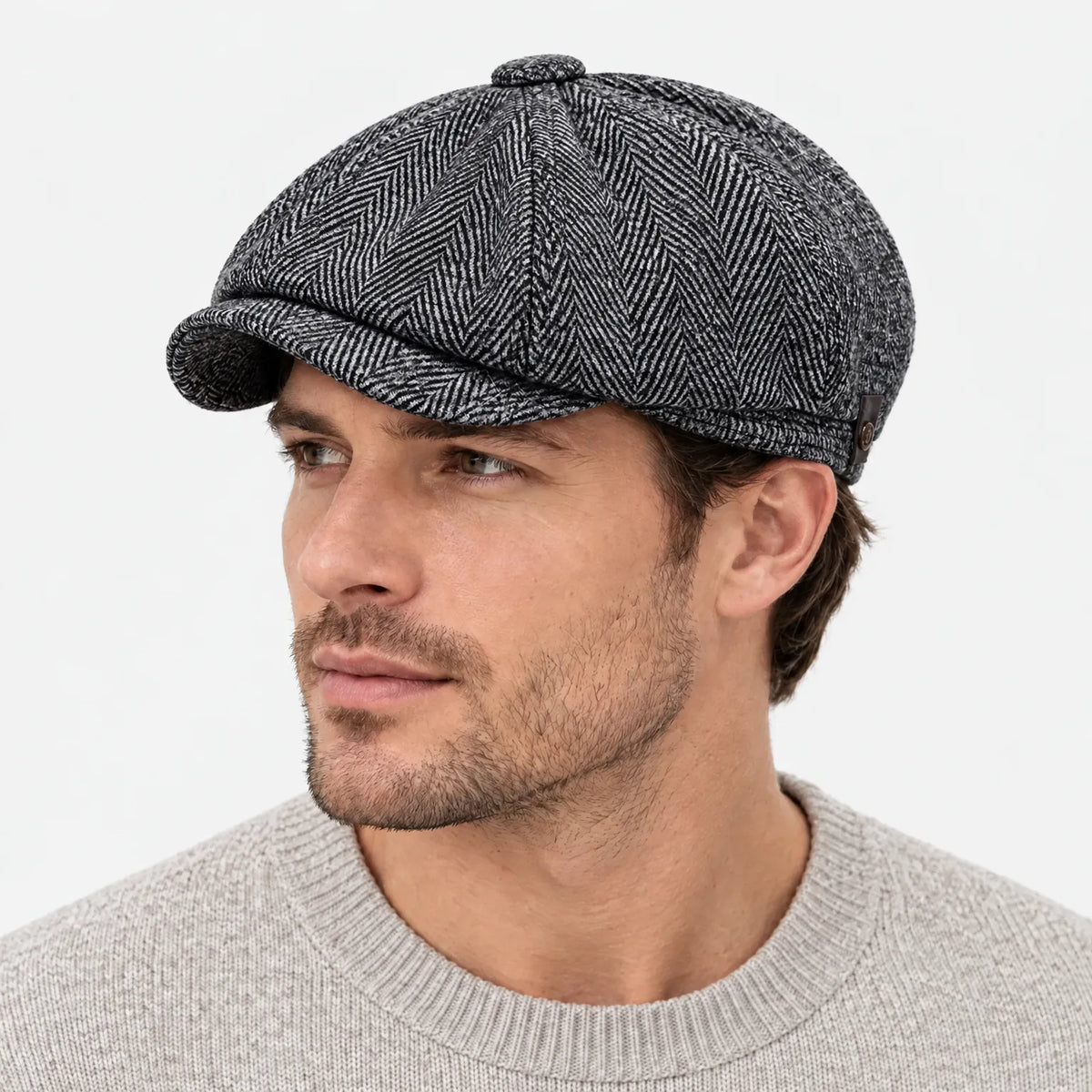 Eight-panel flat cap with herringbone pattern and short peak