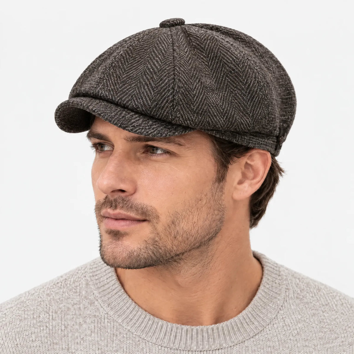 Eight-panel flat cap with herringbone pattern and short peak