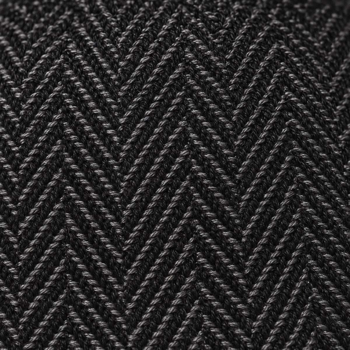 Eight-panel flat cap with herringbone pattern and short peak