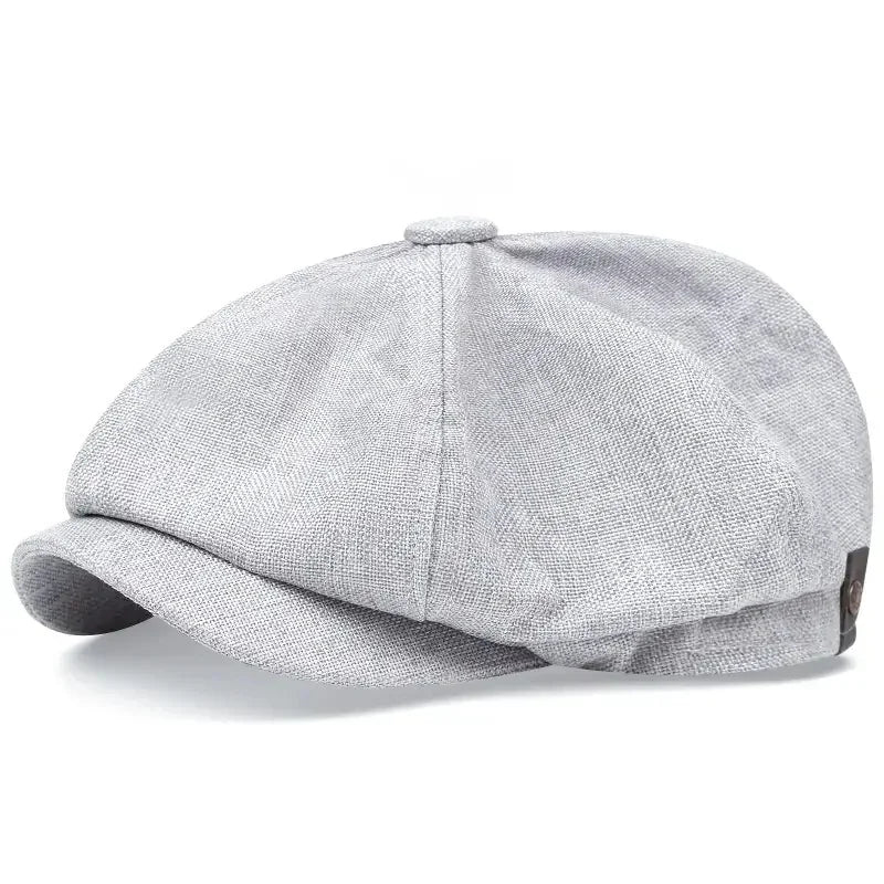 Eight-panel flat cap with herringbone pattern and short peak