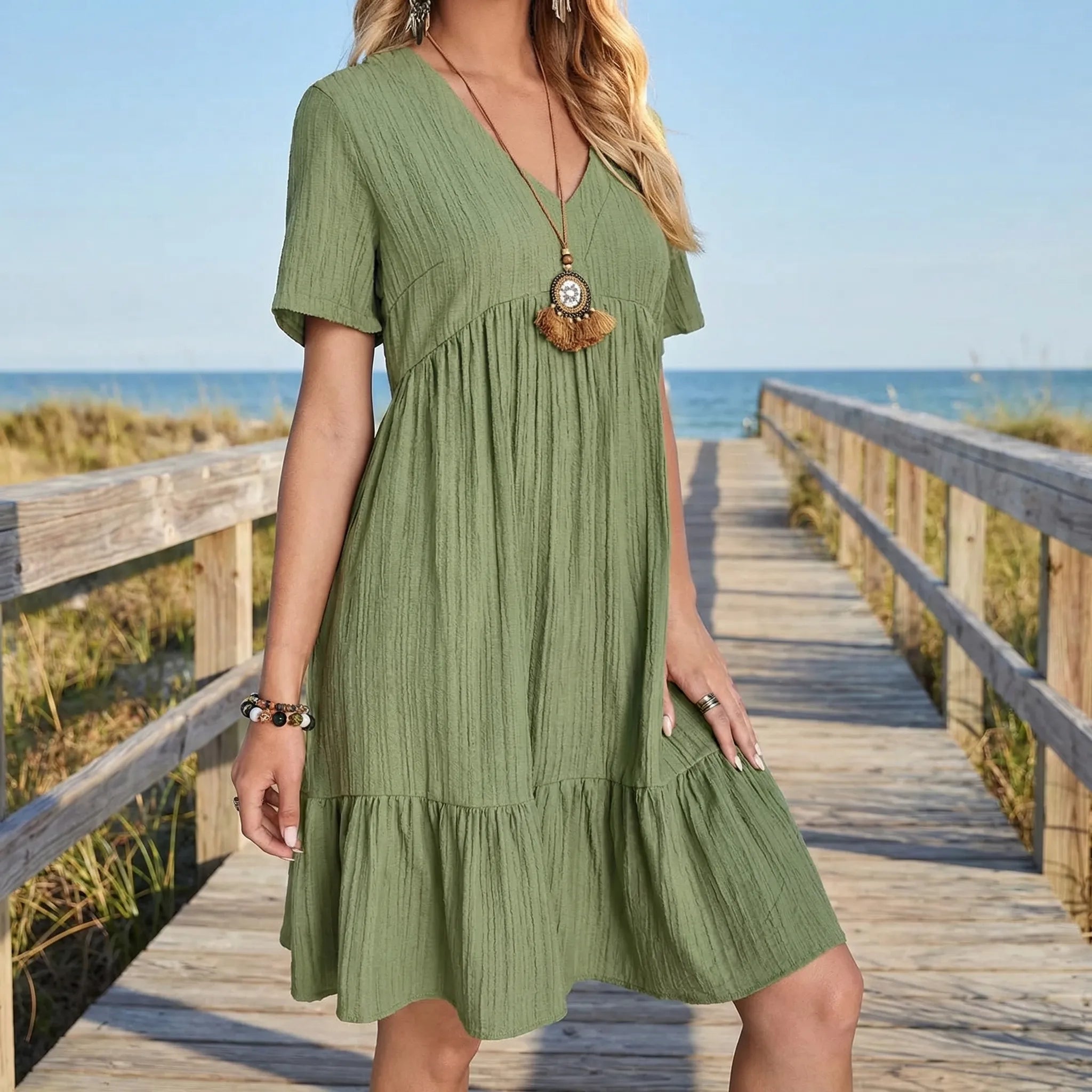 Nordspur | Frillova V-Neck Ruffle Hem Fit And Flare Dress