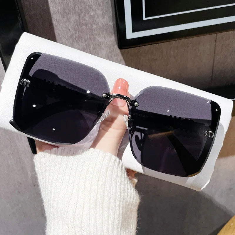 Nordspur | Luxette Rimless Oversized Square Sunglasses