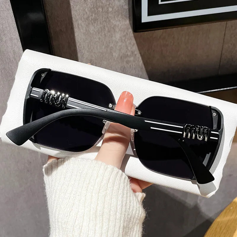 Nordspur | Luxette Rimless Oversized Square Sunglasses