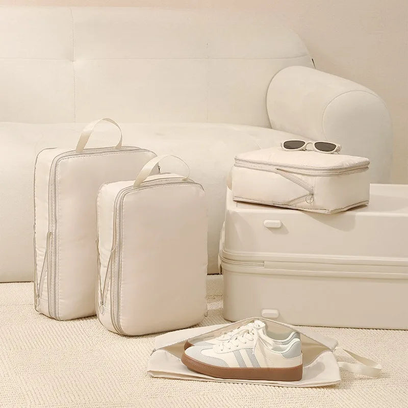 Nordspur | StowMate Four-Piece Compression Luggage Set